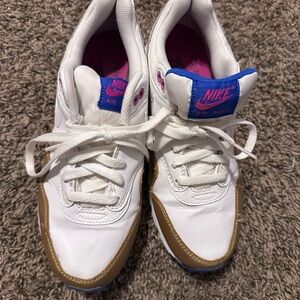 Nike White Leather Sneakers with Gold and Blue Accents